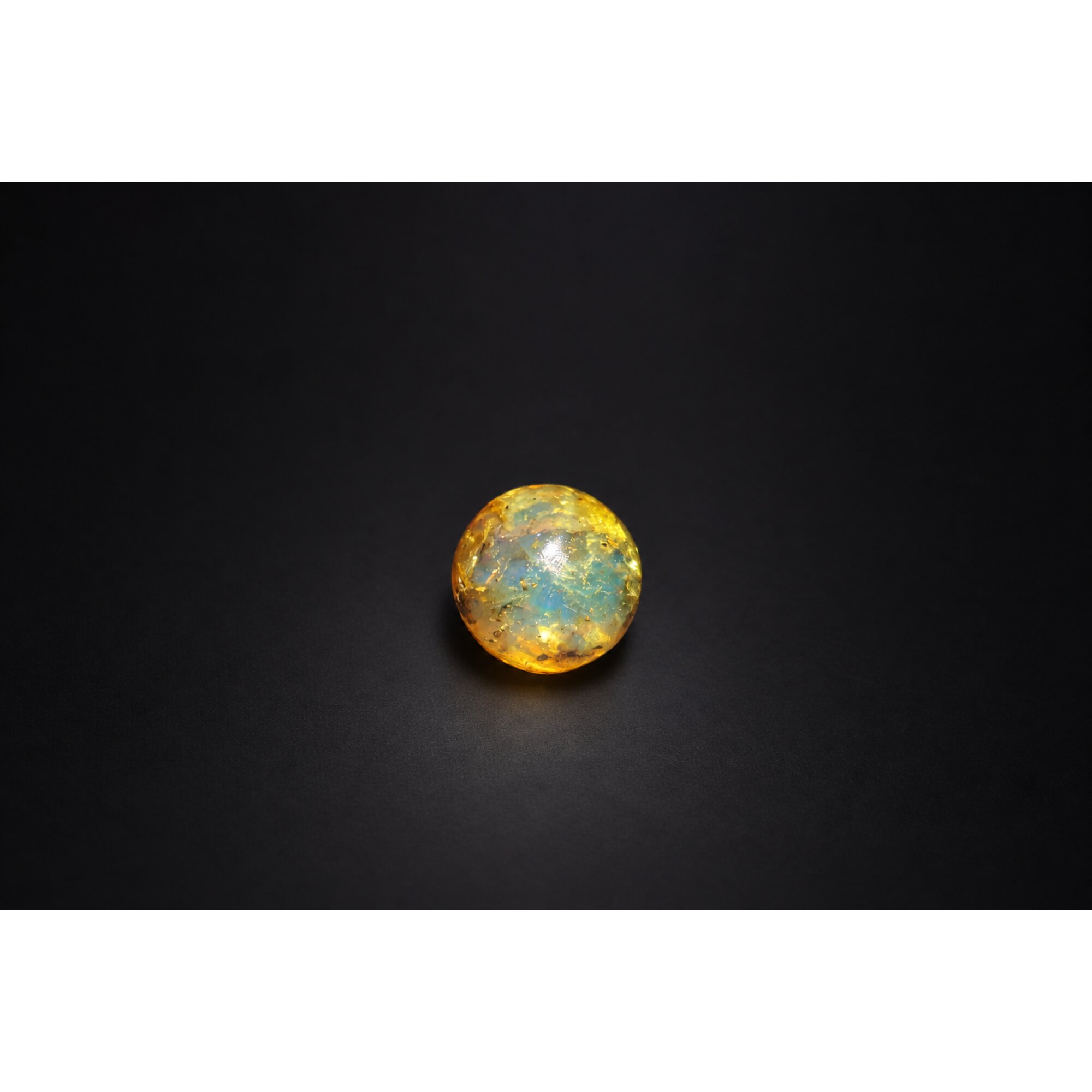 Natural yellow blue Dominican amber sphere/ball 21mm – photo 5