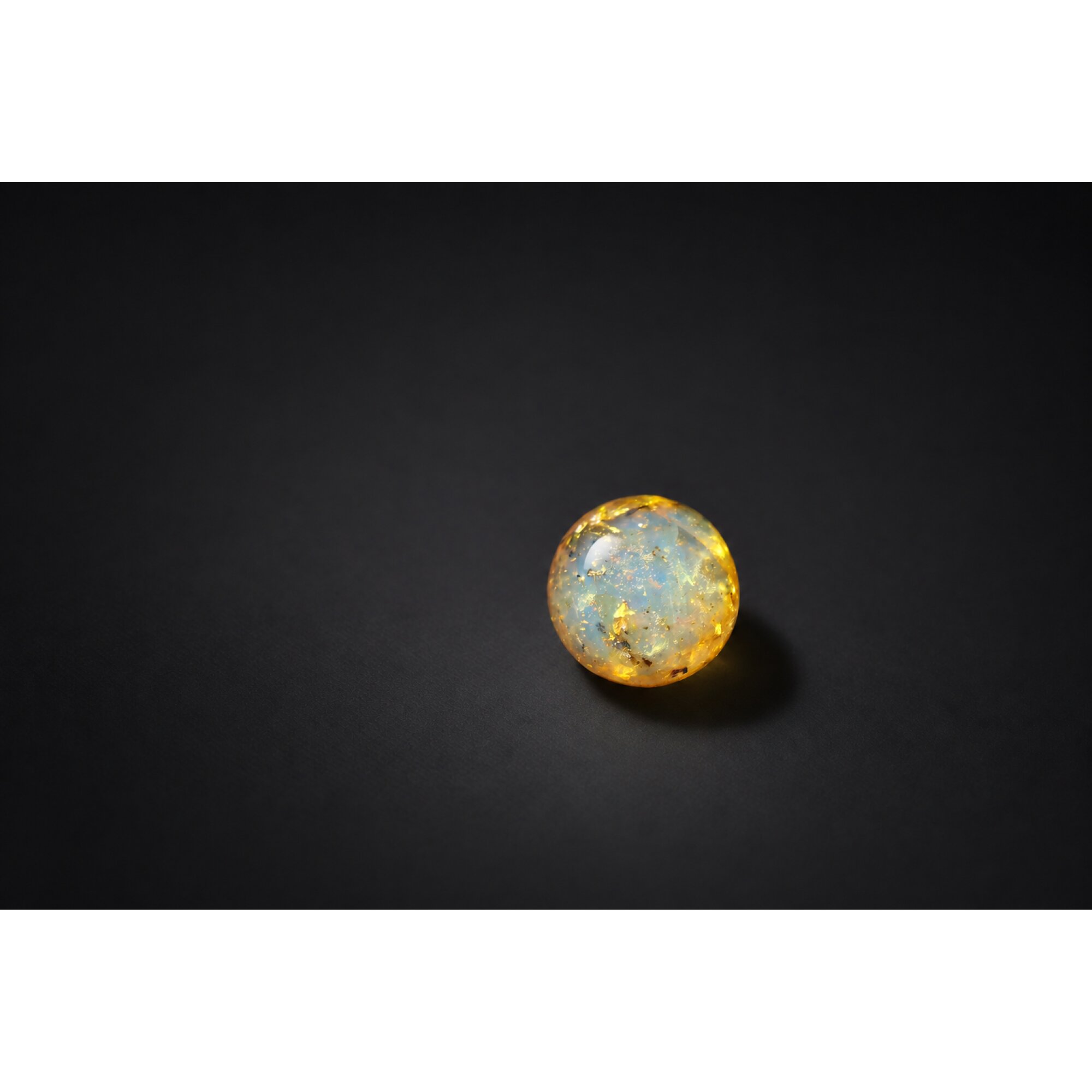 Natural yellow blue Dominican amber sphere/ball 21mm – photo 6