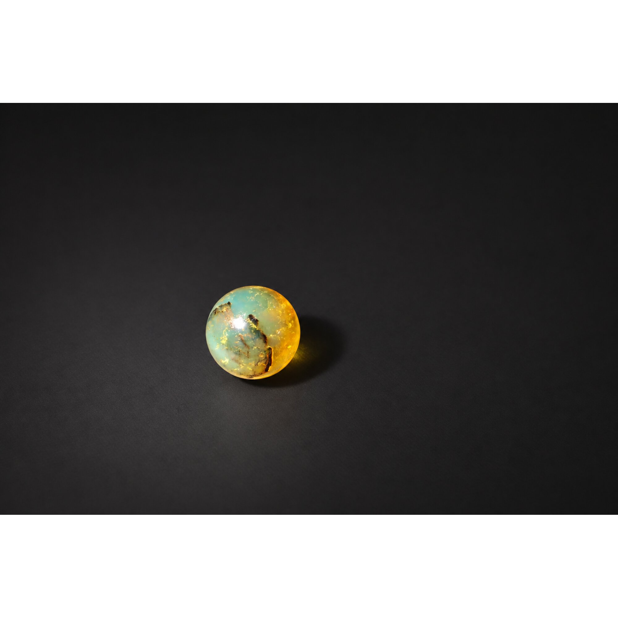 Earth mined yellow blue Dominican amber sphere/ball 17.6mm – photo 4