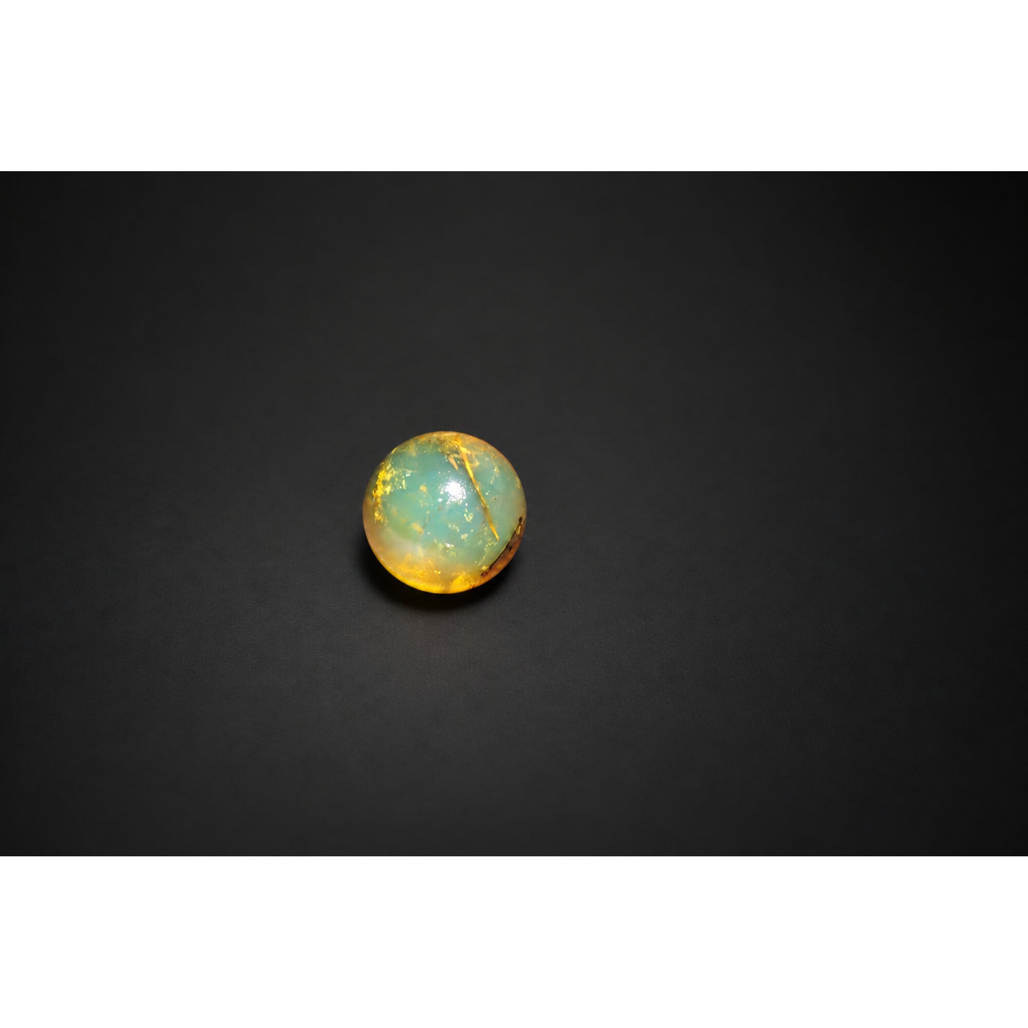 Earth mined yellow blue Dominican amber sphere/ball 17.6mm – photo 5