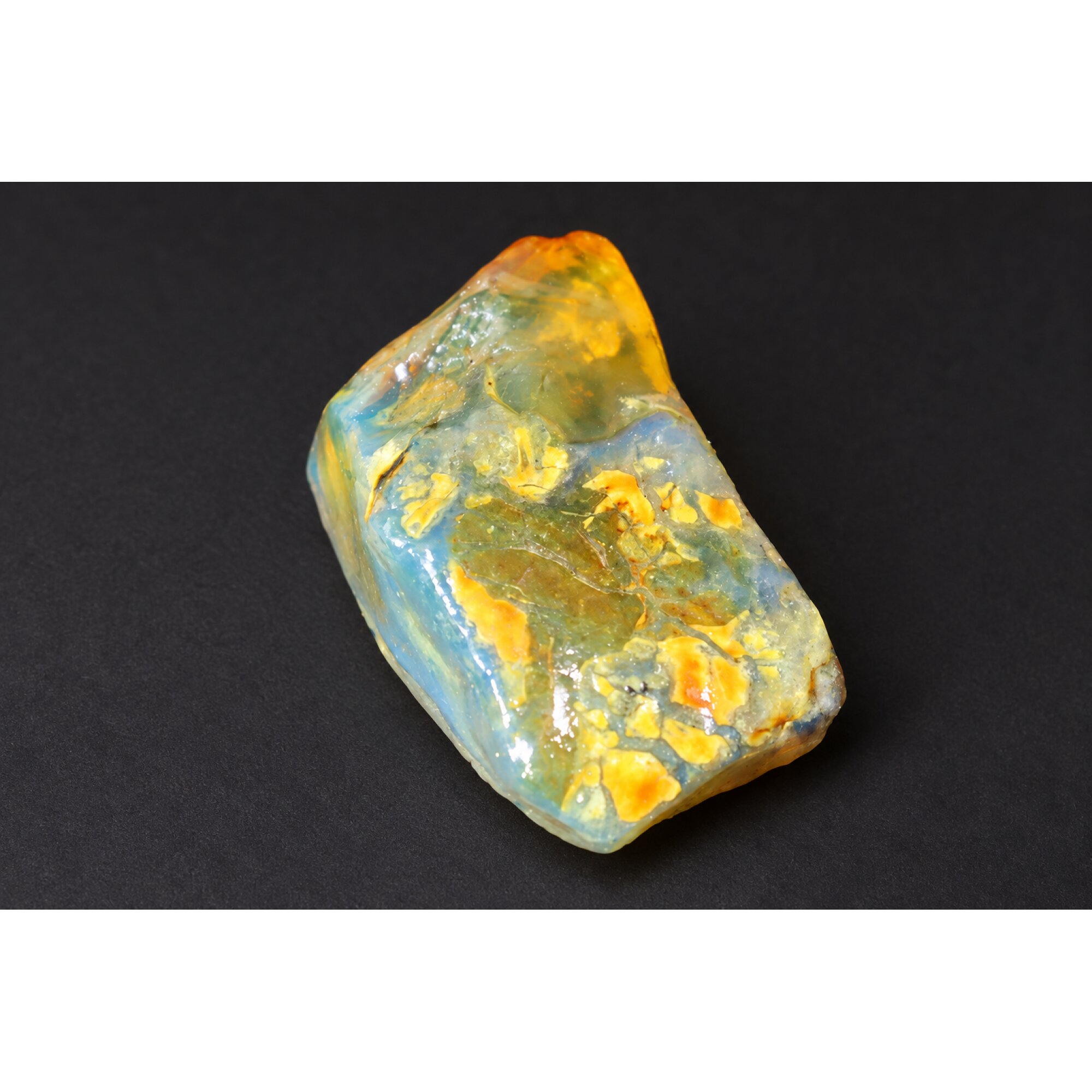 Naturally formed orange blue rough specimen Dominican amber 38mm – photo 2