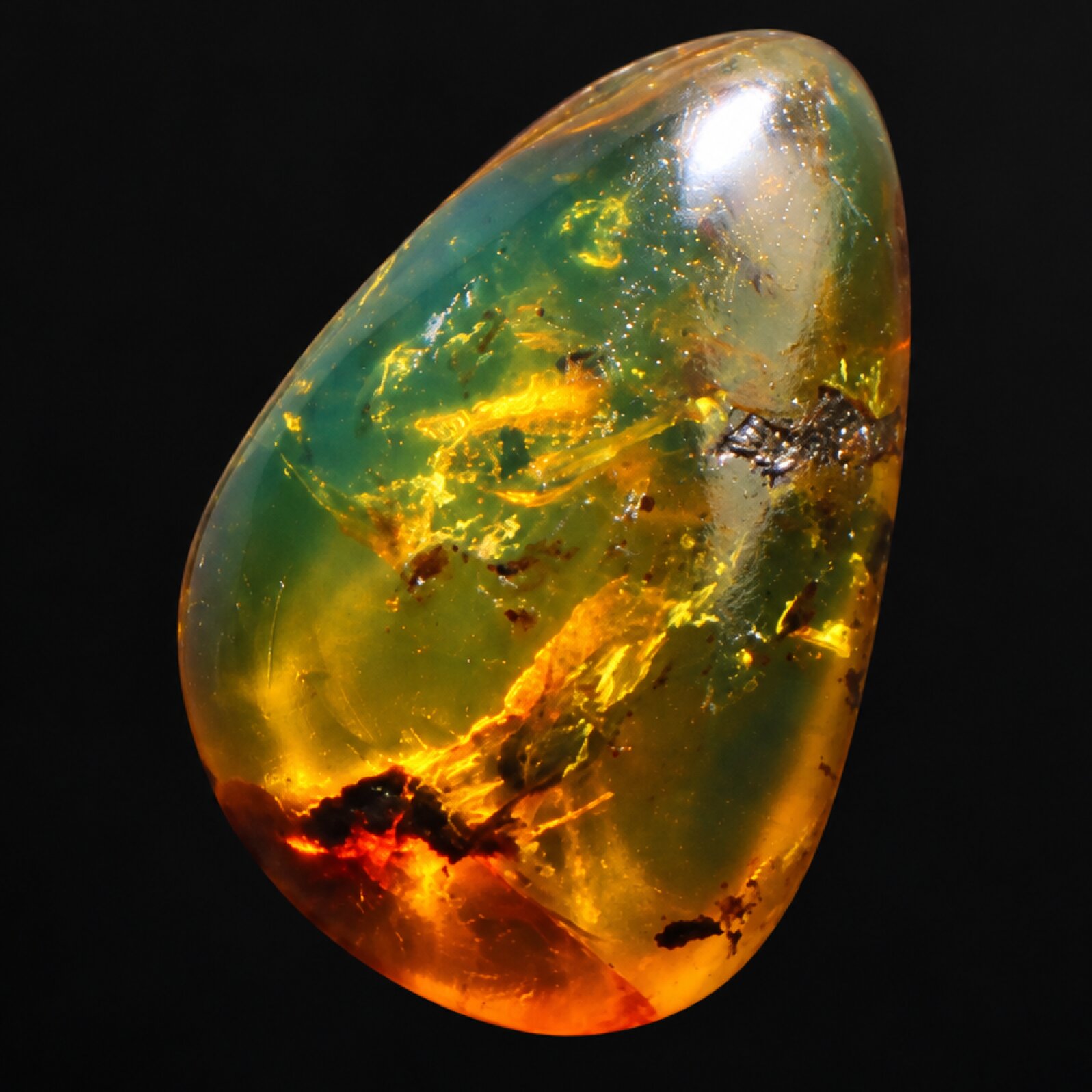 Untreated green blur polished Dominican amber 1.6g
