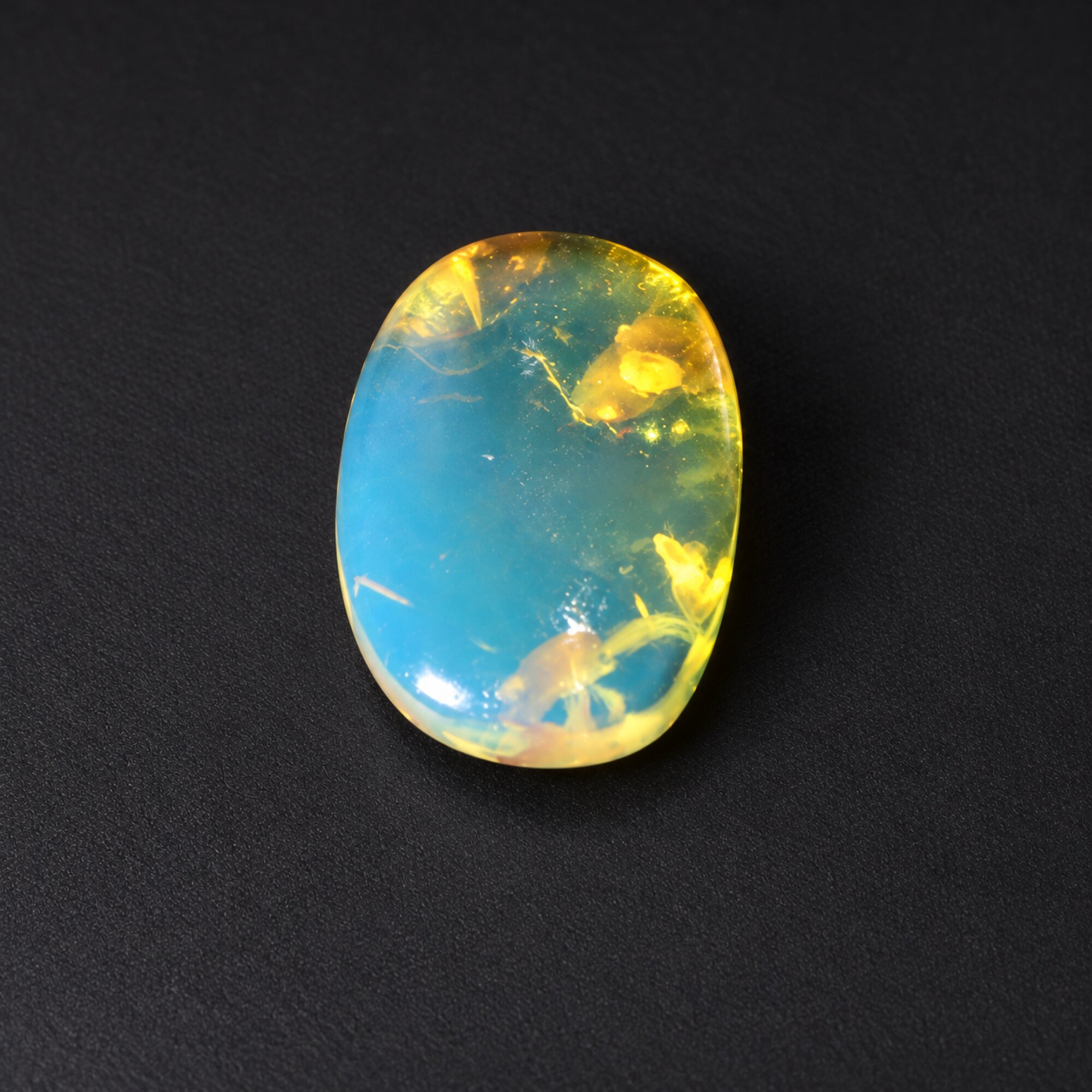 Natural sky blue Dominican amber cabochon – photo 2
