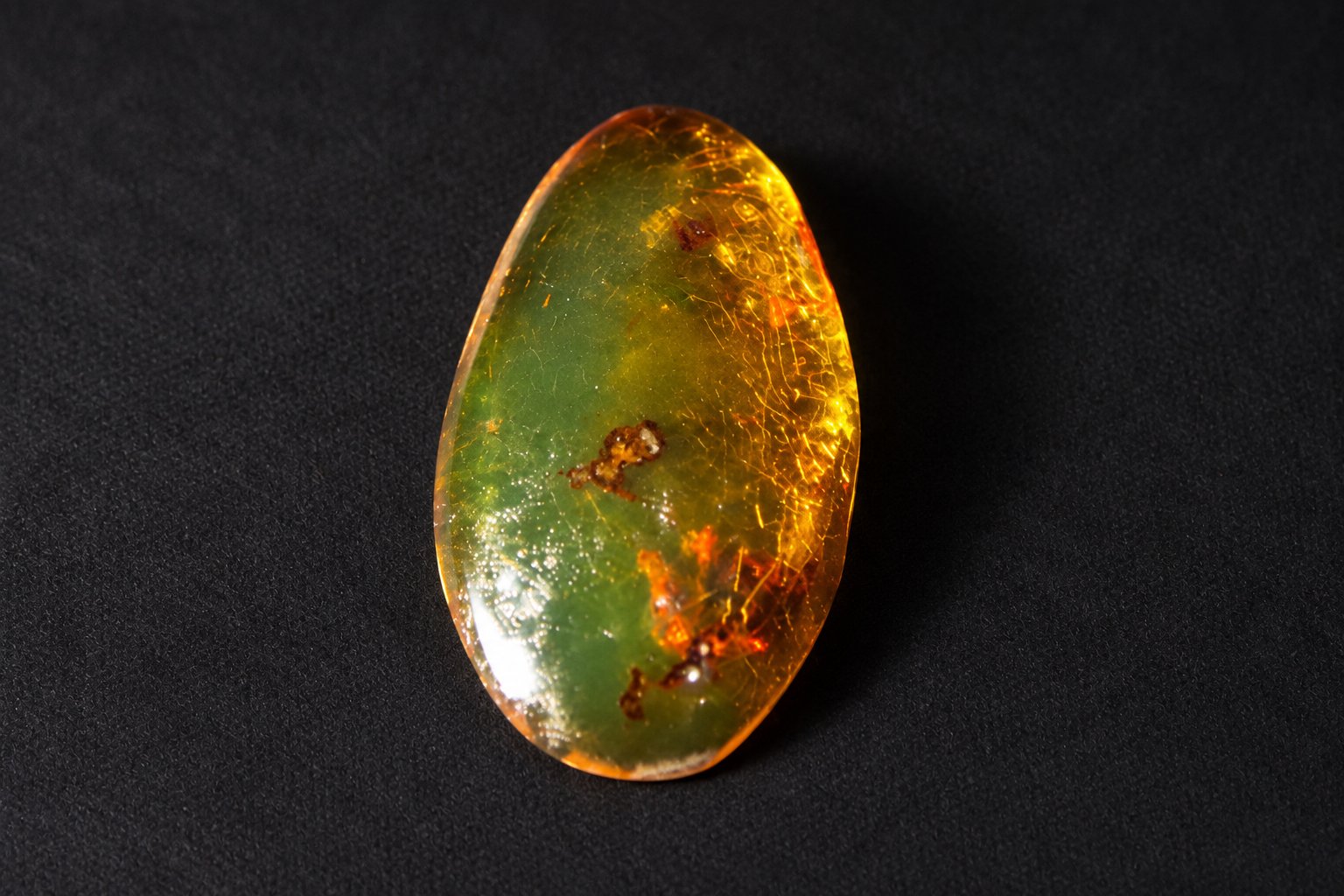 Authentic deep green Dominican amber cabochon – photo 2