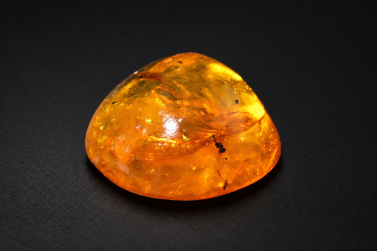 Genuine yellow orange polished Dominican amber